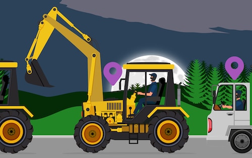 Heavy equipment being stolen by masked thieves at night driving down the road.